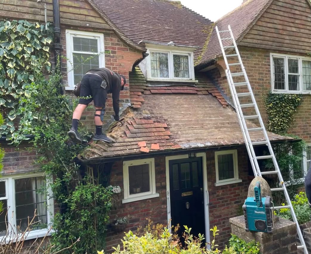 Tile roof repair in West London - before